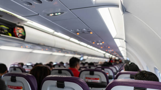 istock On a plane with a lot of people meaning 1188608016