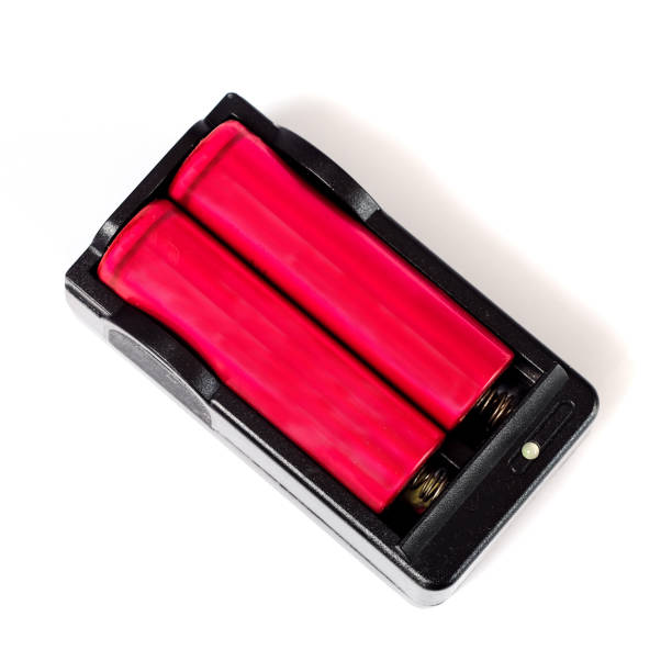 istock 18650 battery charger power on white background . 1188608592