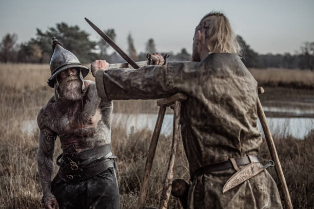 istock Two strong viking men fighting in hand to hand combat 1188611328