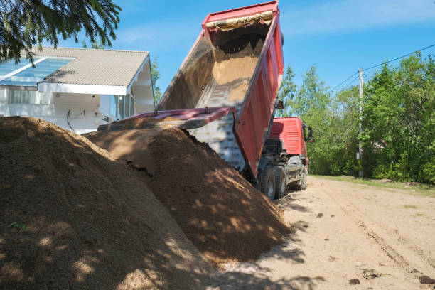 istock truck pours sand on the construction site 1188612869
