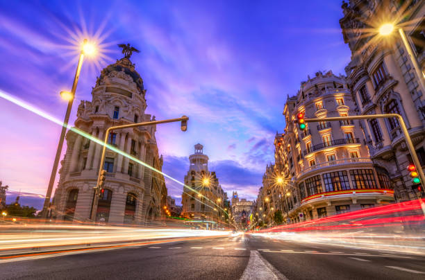 istock Gran via in Madrid at sunset with car light trails. Spain 1188613248