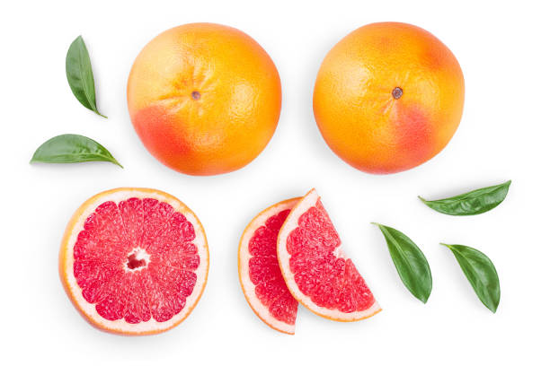 istock Grapefruit and slices with leaves isolated on white background. Top view. Flat lay 1188613361