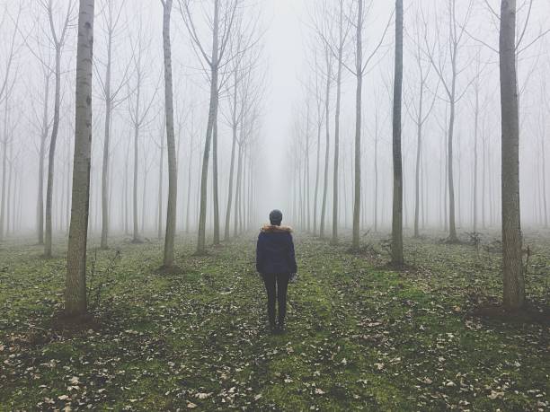 istock a woman in the fog 1188613363