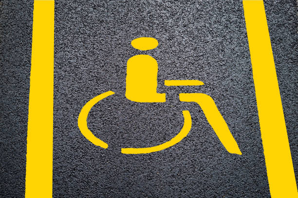 Yellow numbers and signs on the asphalt