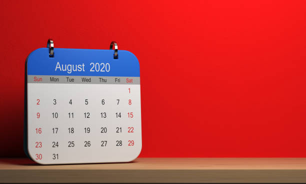 istock Small 2020 calendar with blue cap standing on wooden shelf 1188616267