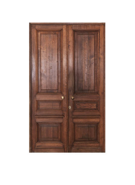istock Old dark brown wooden door isolated 1188616535