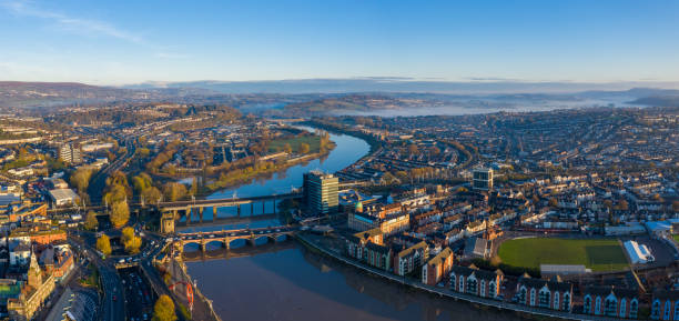Aerial view of Newport City, South Wales An aerial view at sunrise of Newport city centre, south wales United Kingdom, taken from the River Usk high street shops stock pictures, royalty-free photos & images