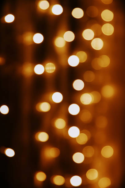 istock Abstract golden background. Festive bokeh lights background. 1188617694
