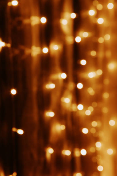 istock Abstract golden background. Festive bokeh lights background. 1188617702