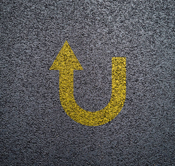 istock Yellow numbers and signs on the asphalt 1188617800