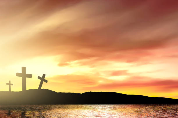 istock Christian cross by the lake 1188618257