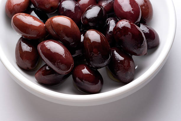 Kalamata black olives  in a dish stock photo