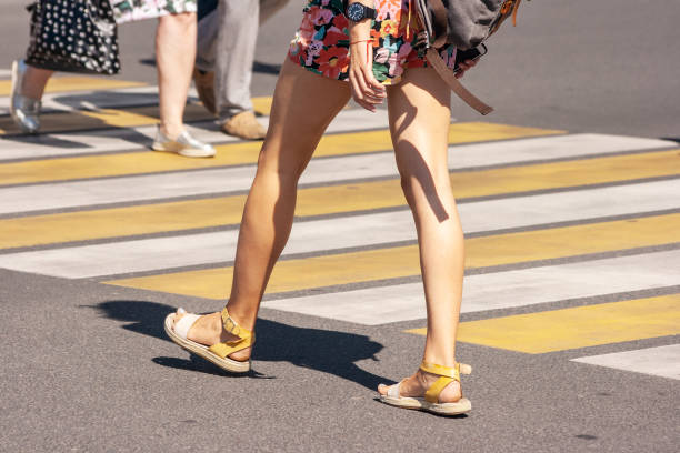 istock pedestrians crossing the street 1188620534