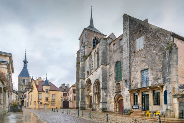 Square, Avallon, United Kingdom Square with Saint Lazare Church in Avallon downtown, France avallon stock pictures, royalty-free photos & images