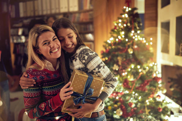 istock happy friends celebrating Christmas together 1188624698