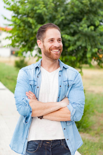 istock Casual guy relaxed in a park 1188624931