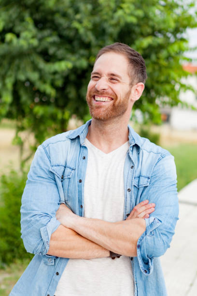 istock Casual guy relaxed in a park 1188624946