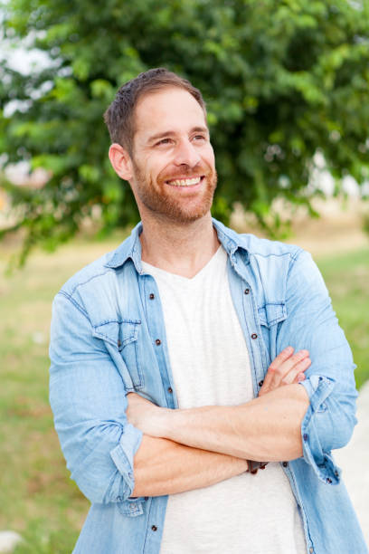 istock Casual guy relaxed in a park 1188624957