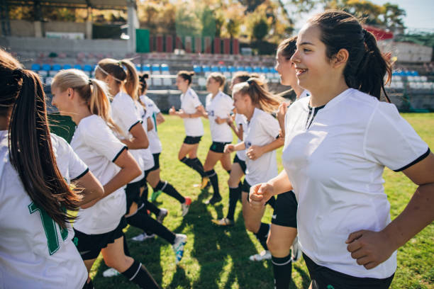 istock Women soccer team warming up together 1188625549
