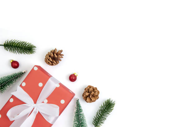 istock Christmas holiday composition with red gift box and decoration isolated on white background, new year and xmas or anniversary with presents in season, top view or flat lay. 1188627419