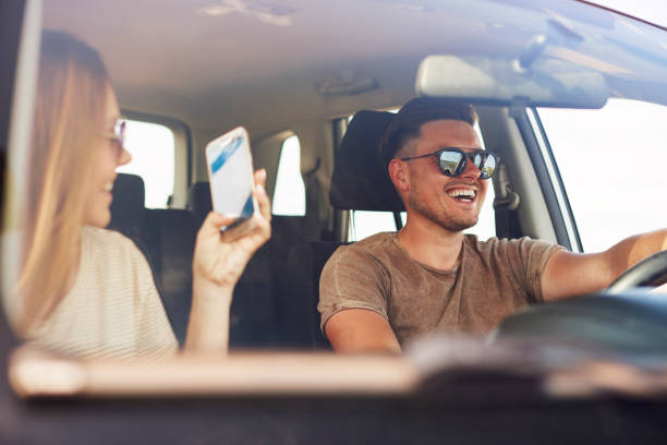 istock Girl taking a photos in a car 1188628181