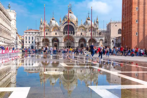 Cathedral Basilica of Saint Mark and Piazza San Marco, St Mark Square, deluged by flood water during Acqua alta which means High water, Venice, Italy