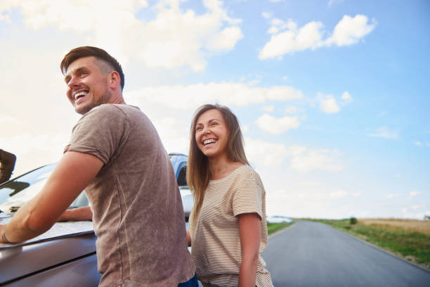 istock Cheerful couple catching a break during summer road trip 1188628924