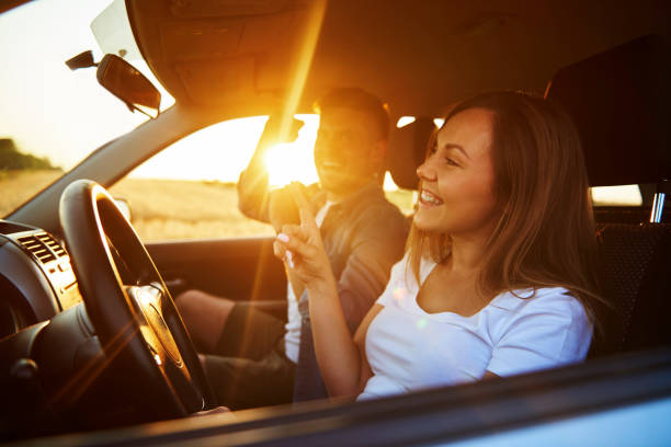 istock Cheerful couple having a fun during road trip 1188630433