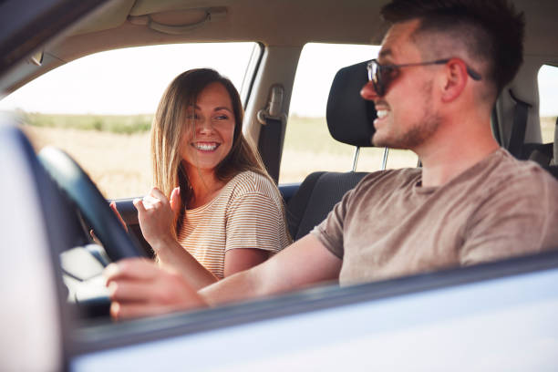 istock Happy couple having a fun during road trip in summertime 1188630562