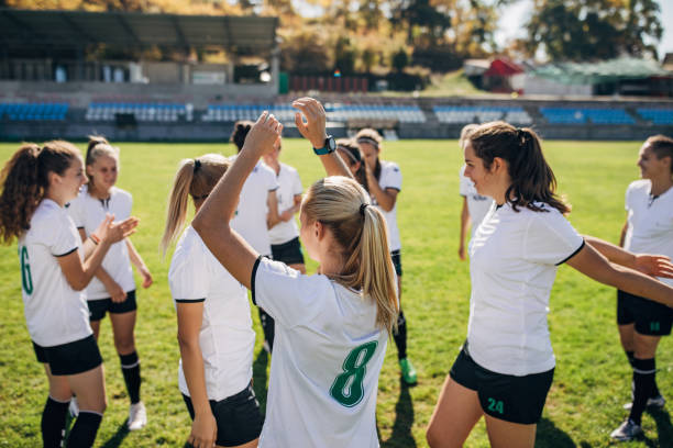 istock Soccer team celebrating victory together 1188635054