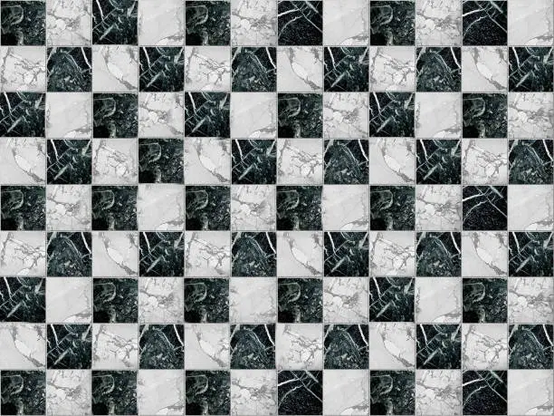 Photo of Geometric mosaic in the form of a chessboard made of marble stone