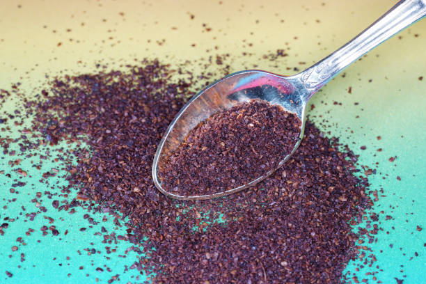 istock Sumac spice with macro lens photographed against colorful gradient in studio 1188643623