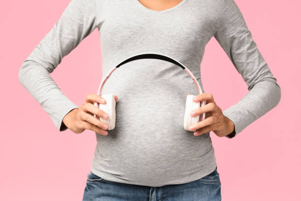3,400+ Pregnant Belly Headphone Stock Photos, Pictures & Royalty-Free
