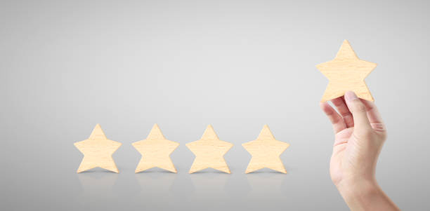 istock Hand of putting increase wood five star shape 1188651046