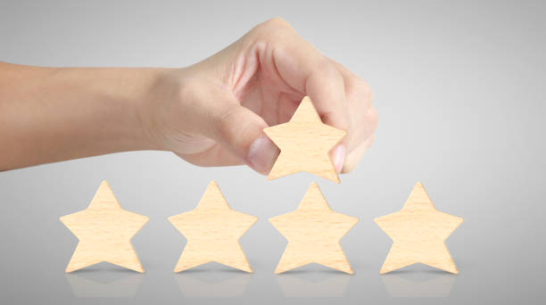 istock Hand of putting increase wood five star shape 1188651048