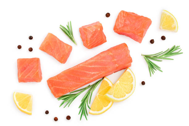istock Slice of salmon with rosemary and lemon isolated on white. Top view. Flat lay ,copyspace for text 1188652196