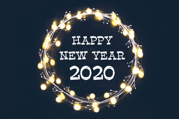 Light garland on black background with New Year greetings 2020