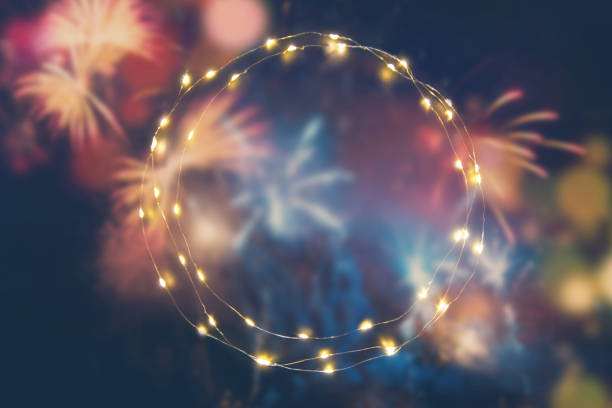 istock Fireworks background with empty lights garland for your text 1188652693