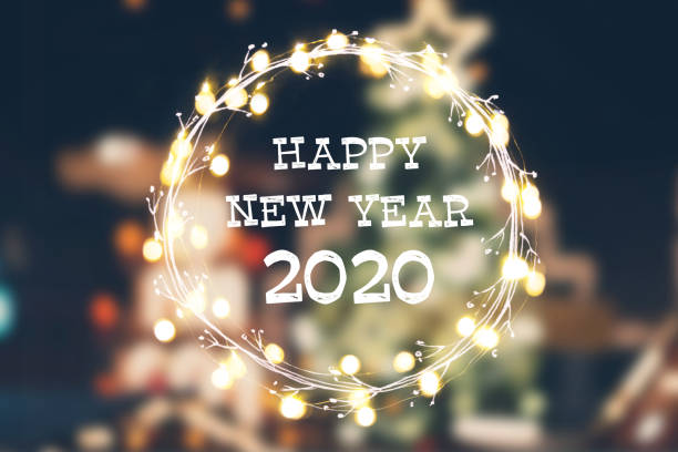 istock Abstract Christmas light background with New Year greetings 2020 1188653885