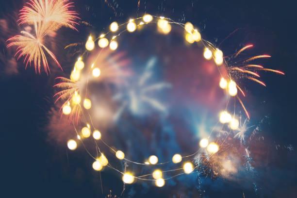 Fireworks background with empty lights garland for your text