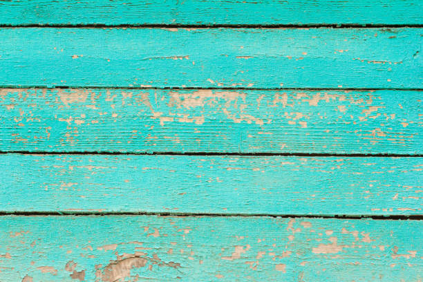 istock Old wooden background with cracked turquoise paint 1188657692