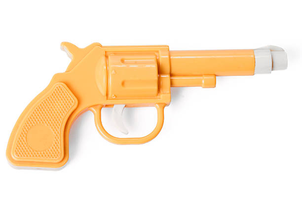 istock yellow toy gun 118865824