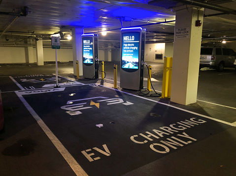 Seattle, USA - Nov 19, 2019: A Volta free EV charging station in Seattle early in the morning in a parking lot.