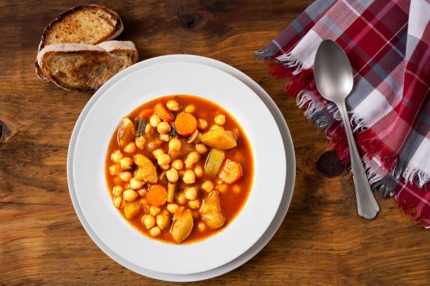 istock Chickpea vegetarian soup served in white plate. 1188663334
