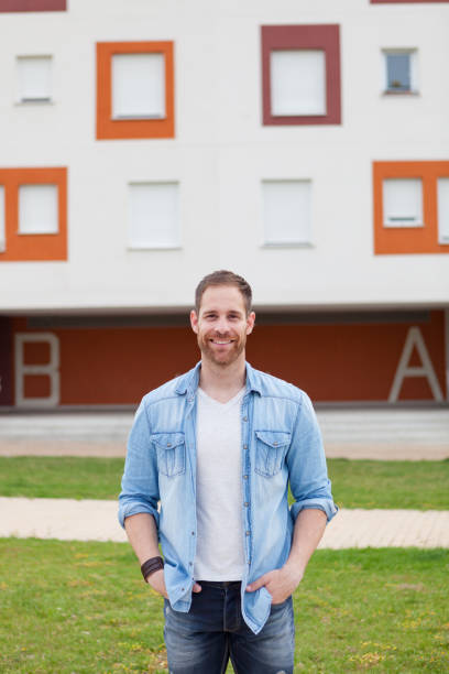 istock Casual guy with a denim shirt relaxed 1188663778