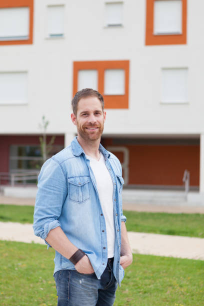istock Casual guy with a denim shirt relaxed 1188663780