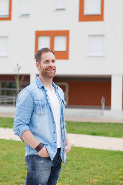 istock Casual guy with a denim shirt relaxed 1188663788
