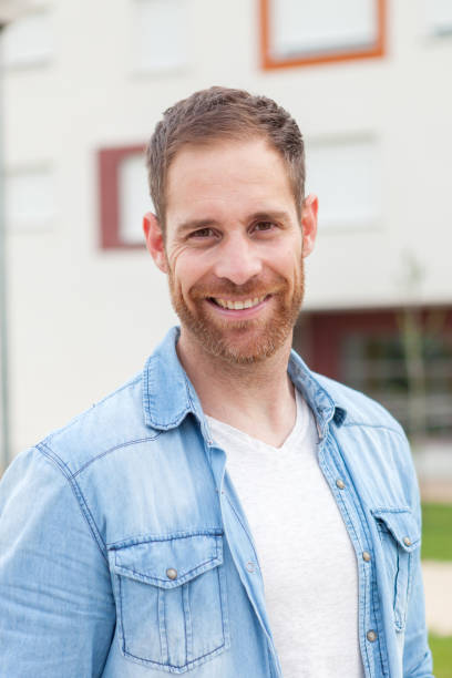 istock Casual guy with a denim shirt relaxed 1188663792