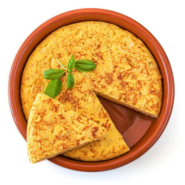 Egg and potato omelet - Authentic  Spanish tortilla tapas  de patatas. Tasty Omelette isolated on white background, top view Egg and potato omelet - Authentic  Spanish tortilla tapas  de patatas. Tasty Omelette isolated on white background, top view tortilla de patatas stock pictures, royalty-free photos & images
