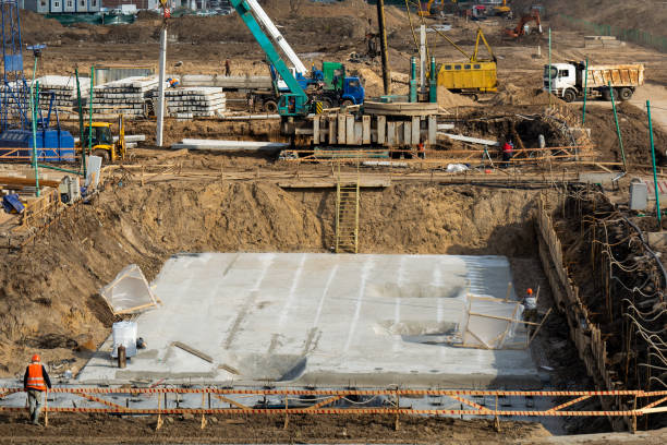 istock process of building a foundation for an apartment building 1188674161